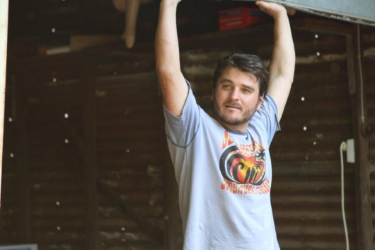 Dick (Justin Rosniak) opening the clinic for the day.