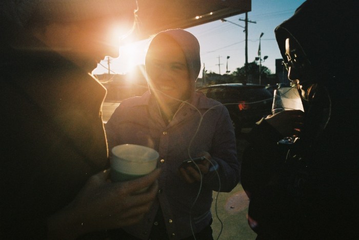 Athena shining. Here she’s playing her Kanye sound mash-up to Kate and Xiao. I laughed so hard the first time I heard it. I was thrilled as well, because I’d wanted to make a film with Athena for a while, and her artwork presented itself as the perfect excuse.