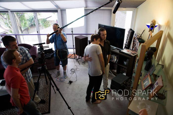 A tender scene in progress. The characters shown, Michael and Gavin, are the LGBT characters that have made this film popular.