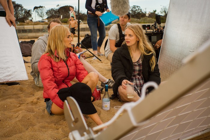 Isabel Lucas and Alice Foulcher working on a scene in That's Not Me. Photo by Ryan Alexander-Lloyd.